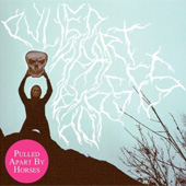 PULLED APART BY HORSES
